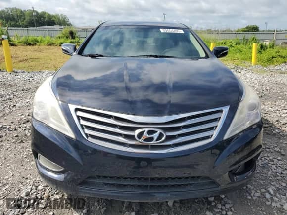 2013 Hyundai Azera с VIN KMHFG4JG2DA316469, выставлен на аукционе Copart как лот 60664495 с пробегом 229 302 миль миль и Списание • Salvage title. История ставок и продаж доступна на DreamBid. Изображение 5.
