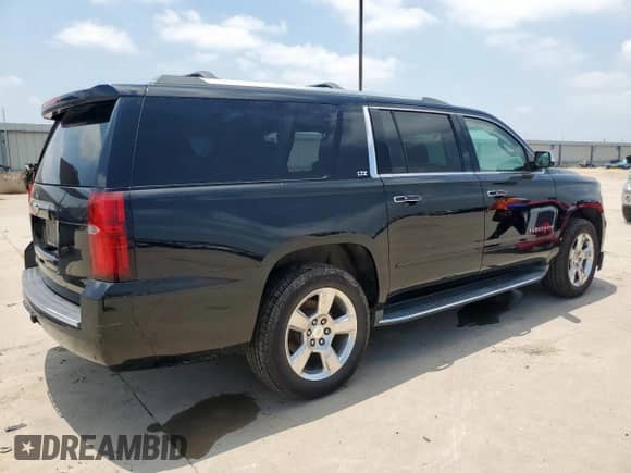 2015 Chevrolet Suburban с VIN 1GNSK8KC6FR702473, выставлен на аукционе Copart как лот 58042995 с пробегом 170 513 миль миль и Списание • Salvage title. История ставок и продаж доступна на DreamBid. Изображение 3.