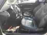 2007 MINI Hardtop with VIN WMWMF33547TT51590, listed as a Copart auction lot 57323995 with 114,113 mi miles and Salvage title. Bid and sale history available at DreamBid. Image 7.