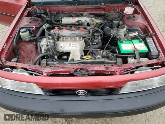 1990 Toyota Camry z VIN JT2SV24E4L3422585, wystawiony jako Copart lot #84872844 z przebiegiem 119 987 mil mil oraz Szkoda całkowita • Salvage title. Historia ofert i sprzedaży dostępna na DreamBid. Obrazek 11.