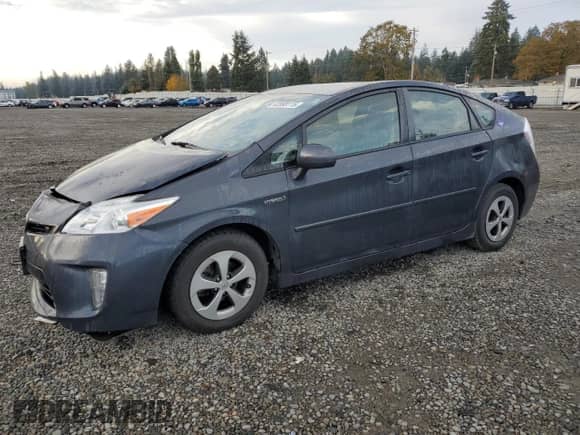 2015 Toyota Prius Two with VIN JTDKN3DU5F0450647, listed as a Copart auction lot 82698115 with 179,250 mi miles and Salvage title. Bid and sale history available at DreamBid. Image 1.