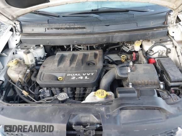 2015 Dodge Journey American Value z VIN 3C4PDCAB8FT605870, wystawiony jako IAAI lot #43035703 z przebiegiem 215 596 mil mil oraz . Historia ofert i sprzedaży dostępna na DreamBid. Obrazek 10.