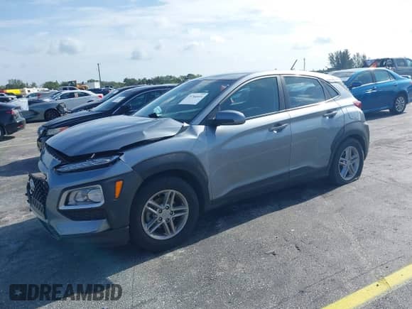 2021 Hyundai Kona SE z VIN KM8K12AA6MU705288, wystawiony jako IAAI lot #39764414 z przebiegiem 75 528 mil mil oraz . Historia ofert i sprzedaży dostępna na DreamBid. Obrazek 2.