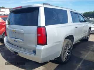 2015 Chevrolet Suburban LTZ with VIN 1GNSKKKC8FR145286, listed as a IAAI auction lot 43119290 with 185,912 mi miles and . Bid and sale history available at DreamBid. Image 4.