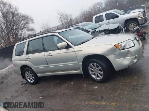 2006 Subaru Forester X with VIN JF1SG65686H740724, listed as a IAAI auction lot 41458553 with 126,621 mi miles and . Bid and sale history available at DreamBid. Image 13.