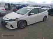 2018 Toyota Prius Plus z VIN JTDKARFP9J3095575, wystawiony jako IAAI lot #42408526 z przebiegiem 166 914 mil mil oraz . Historia ofert i sprzedaży dostępna na DreamBid. Obrazek 2.
