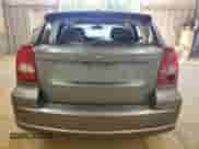 2011 Dodge Caliber Mainstreet with VIN 1B3CB3HAXBD261722, listed as a Copart auction lot 82446015 with 151,548 mi miles and Salvage title. Bid and sale history available at DreamBid. Image 6.