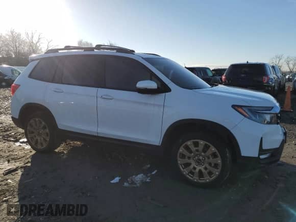 2023 Honda Passport EX-L с VIN 5FNYF8H57PB016515, выставлен на аукционе Copart как лот 83520014 с пробегом Не указан миль и Списание • Salvage title. История ставок и продаж доступна на DreamBid. Изображение 4.
