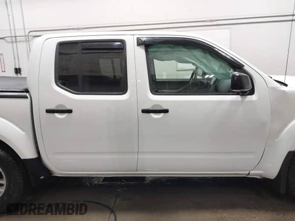 2019 Nissan Frontier SV z VIN 1N6AD0EV5KN773448, wystawiony jako IAAI lot #41611922 z przebiegiem 77 010 mil mil oraz . Historia ofert i sprzedaży dostępna na DreamBid. Obrazek 13.