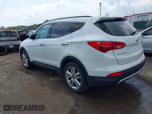 2014 Hyundai Santa Fe with VIN 5XYZU3LA9EG200085, listed as a IAAI auction lot 43003393 with 90,660 mi miles and . Bid and sale history available at DreamBid. Image 3.