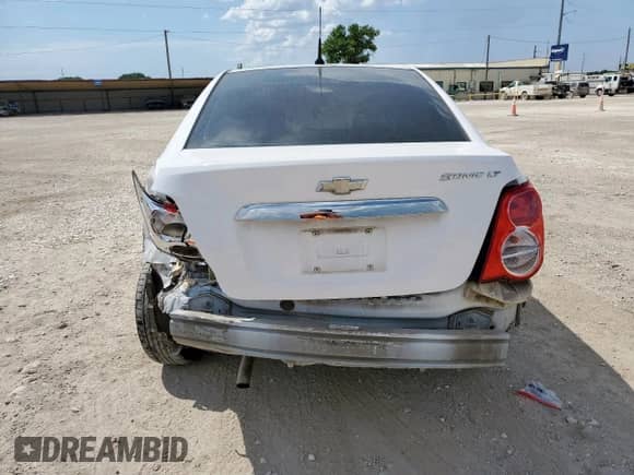 2012 Chevrolet Sonic LT с VIN 1G1JD5SH4C4101671, выставлен на аукционе Copart как лот 67421065 с пробегом 159 242 миль миль и Списание • Salvage title. История ставок и продаж доступна на DreamBid. Изображение 6.