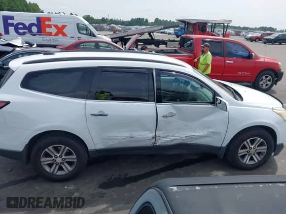 2016 Chevrolet Traverse LT z VIN 1GNKRHKD1GJ282156, wystawiony jako IAAI lot #43041386 z przebiegiem 122 607 mil mil oraz . Historia ofert i sprzedaży dostępna na DreamBid. Obrazek 13.