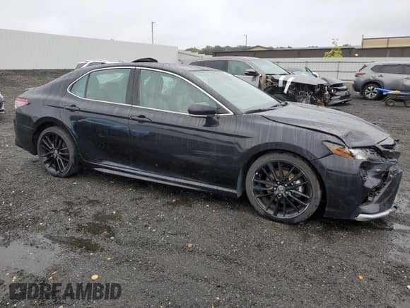 2023 Toyota Camry Hybrid XSE с VIN 4T1K31AK0PU614339, выставлен на аукционе Copart как лот 68635715 с пробегом 87 939 миль миль и Списание • Salvage title. История ставок и продаж доступна на DreamBid. Изображение 4.