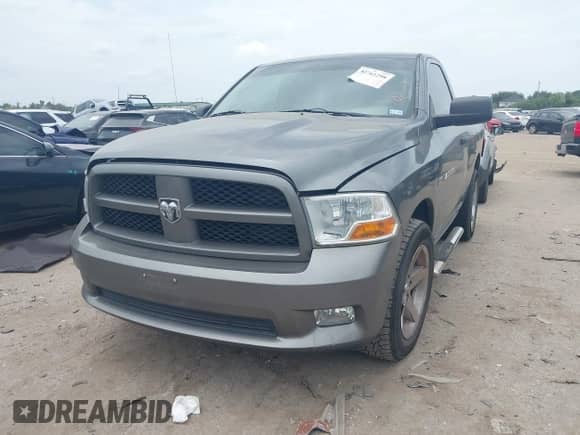 2012 Ram 1500 Express с VIN 3C6JD6AT3CG261294, выставлен на аукционе IAAI как лот 42761298 с пробегом 117 477 миль миль и . История ставок и продаж доступна на DreamBid. Изображение 2.