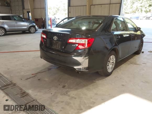 2012 Toyota Camry L with VIN 4T1BF1FK7CU031079, listed as a IAAI auction lot 43233913 with 186,276 mi miles and . Bid and sale history available at DreamBid. Image 4.