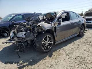 2019 Toyota Camry Hybrid LE с VIN 4T1B21HK2KU513773, выставлен на аукционе Copart как лот 70576645 с пробегом Не указан миль и Списание • Salvage title. История ставок и продаж доступна на DreamBid. Изображение 1.