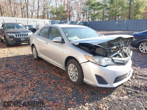 2012 Toyota Camry XLE z VIN 4T1BF1FK8CU095891, wystawiony jako IAAI lot #40877761 z przebiegiem 152 163 mil mil oraz . Historia ofert i sprzedaży dostępna na DreamBid. Obrazek 1.