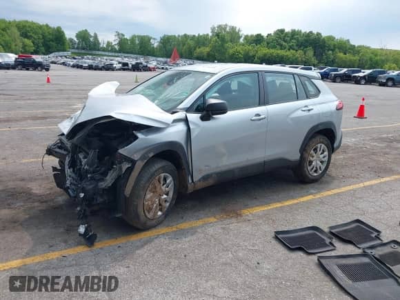 2022 Toyota Corolla Cross L with VIN 7MUAAABG5NV013841, listed as a IAAI auction lot 42396285 with 36,780 mi miles and . Bid and sale history available at DreamBid. Image 2.