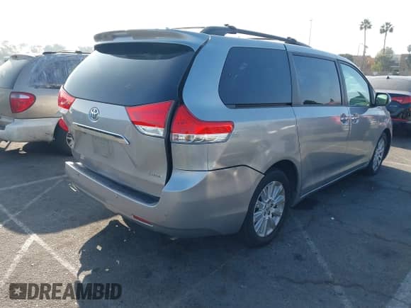 2013 Toyota Sienna XLE AAS with VIN 5TDYK3DC0DS360388, listed as a IAAI auction lot 41163681 with 146,920 mi miles and . Bid and sale history available at DreamBid. Image 4.