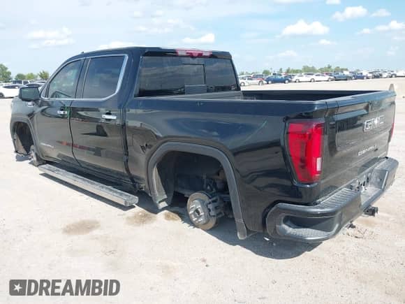 2021 GMC Sierra 1500 Denali with VIN 3GTU9FET5MG303337, listed as a IAAI auction lot 43105491 with 76,727 mi miles and . Bid and sale history available at DreamBid. Image 3.
