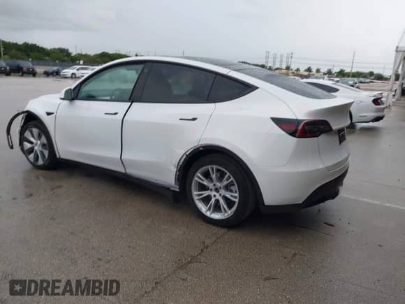 2022 Tesla Model Y Long Range z VIN 7SAYGDEE4NF510003, wystawiony jako IAAI lot #43185983 z przebiegiem 25 165 mil mil oraz . Historia ofert i sprzedaży dostępna na DreamBid. Obrazek 3.