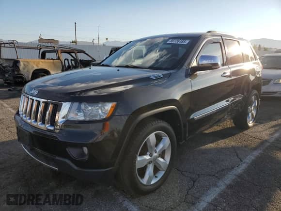 2012 Jeep Grand Cherokee Overland z VIN 1C4RJFCG2CC252898, wystawiony jako Copart lot #80726185 z przebiegiem 91 276 mil mil oraz Szkoda całkowita • Salvage title. Historia ofert i sprzedaży dostępna na DreamBid. Obrazek 1.