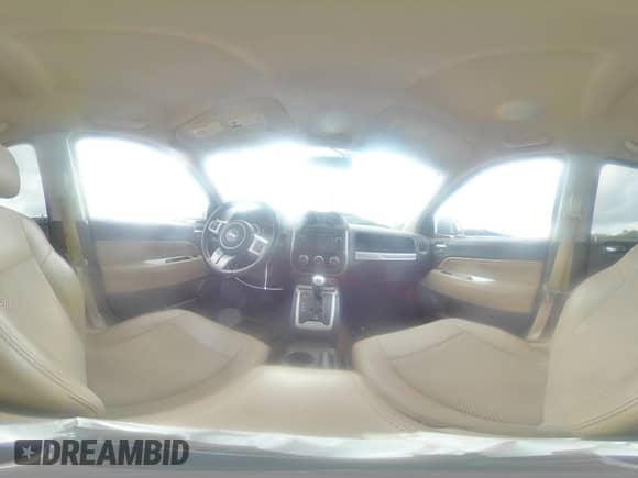 2017 Jeep Compass Latitude with VIN 1C4NJCEA7HD115169, listed as a Copart auction lot 65231945 with 169,540 mi miles and Salvage title. Bid and sale history available at DreamBid. Image 15.