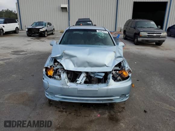 2004 Hyundai Accent GL с VIN KMHCG35CX4U293817, выставлен на аукционе Copart как лот 86087074 с пробегом Не указан миль и Списание • Salvage title. История ставок и продаж доступна на DreamBid. Изображение 5.