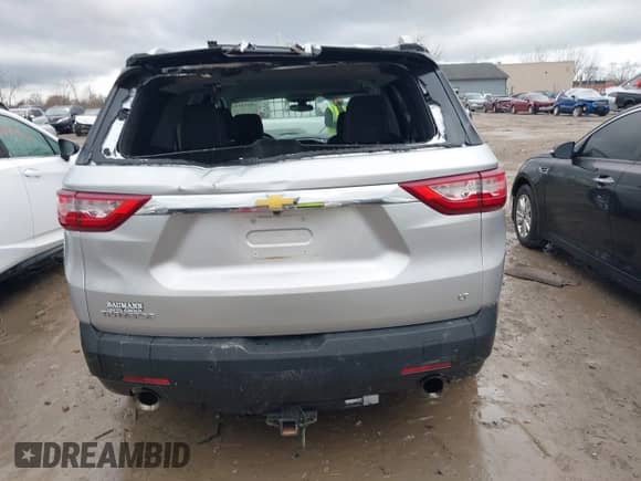 2018 Chevrolet Traverse LT Cloth with VIN 1GNERGKW8JJ104647, listed as a IAAI auction lot 41942646 with 94,745 mi miles and . Bid and sale history available at DreamBid. Image 16.