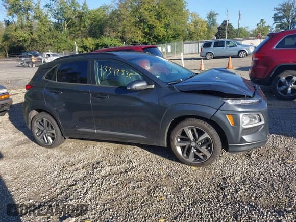 2021 Hyundai Kona Ultimate z VIN KM8K5CA50MU675072, wystawiony jako IAAI lot #43392535 z przebiegiem 44 752 mil mil oraz . Historia ofert i sprzedaży dostępna na DreamBid. Obrazek 13.