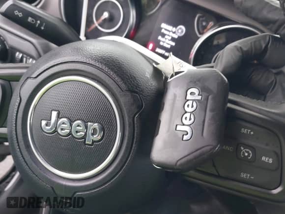 2022 Jeep Wrangler Unlimited Sport с VIN 1C4HJXDG1NW251565, выставлен на аукционе IAAI как лот 41163076 с пробегом 24 877 миль миль и . История ставок и продаж доступна на DreamBid. Изображение 11.