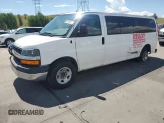 2015 Chevrolet Express Passenger LT с VIN 1GAZG1FG6F1217514, выставлен на аукционе Copart как лот 64759505 с пробегом 270 681 миль миль и Чистый • Clean title. История ставок и продаж доступна на DreamBid. Изображение 1.
