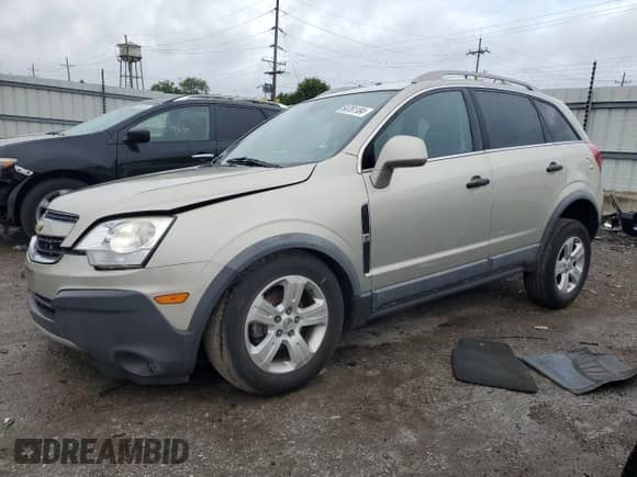 2013 Chevrolet Captiva Sport LS z VIN 3GNAL2EK2DS627418, wystawiony jako Copart lot #64761184 z przebiegiem 82 313 mil mil oraz Szkoda całkowita • Salvage title. Historia ofert i sprzedaży dostępna na DreamBid. Obrazek 1.
