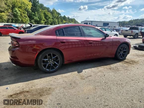 2019 Dodge Charger SXT with VIN 2C3CDXBG7KH504858, listed as a Copart auction lot 84907825 with 169,734 mi miles and Salvage title. Bid and sale history available at DreamBid. Image 3.