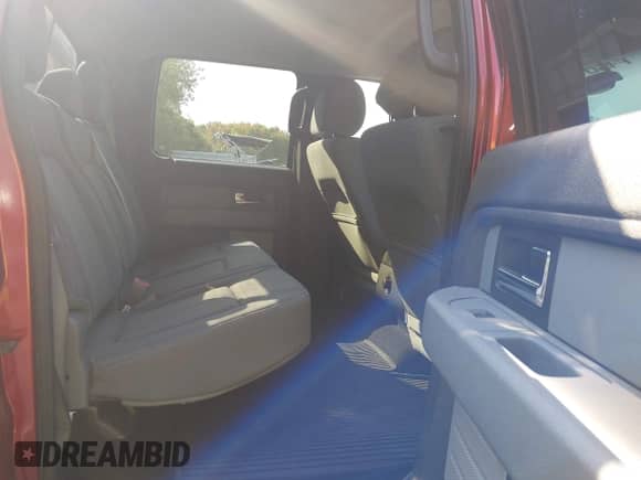 2013 Ford F-150 Lariat with VIN 1FTFW1ET5DKD04467, listed as a IAAI auction lot 43355676 with 124,871 mi miles and . Bid and sale history available at DreamBid. Image 8.