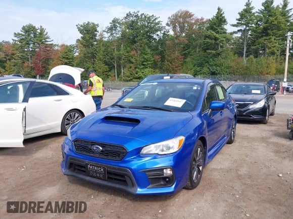 2018 Subaru WRX with VIN JF1VA1A65J9815972, listed as a IAAI auction lot 43264947 with 107,333 mi miles and . Bid and sale history available at DreamBid. Image 2.