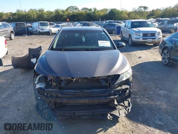 2019 Toyota Camry SE z VIN 4T1B11HK9KU259594, wystawiony jako IAAI lot #43482552 z przebiegiem 112 600 mil mil oraz . Historia ofert i sprzedaży dostępna na DreamBid. Obrazek 12.