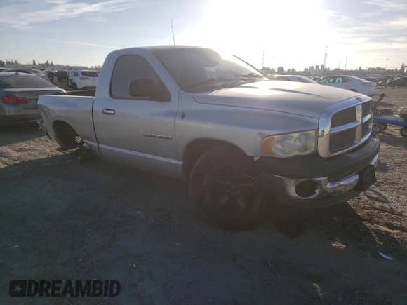 2003 Dodge 1500 ST with VIN 1D7HA16K63J521632, listed as a Copart auction lot 89514085 with 173,798 mi miles and Salvage title. Bid and sale history available at DreamBid. Image 4.