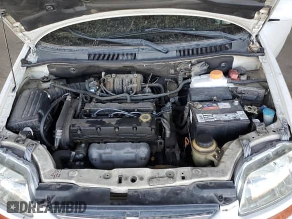 2008 Chevrolet Aveo LS z VIN KL1TD66658B099017, wystawiony jako Copart lot #78666804 z przebiegiem 210 944 mil mil oraz Czysty tytuł • Clean title. Historia ofert i sprzedaży dostępna na DreamBid. Obrazek 11.