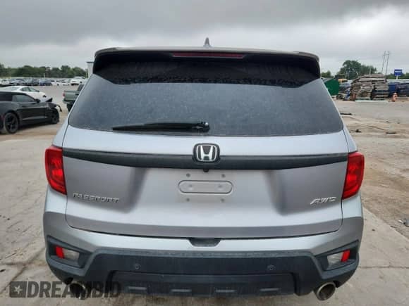 2022 Honda Passport EX-L with VIN 5FNYF8H57NB024420, listed as a Copart auction lot 67348855 with 136,849 mi miles and Salvage title. Bid and sale history available at DreamBid. Image 6.