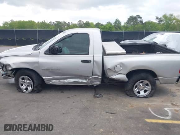 2003 Dodge 1500 ST with VIN 1D7HA16K13J682308, listed as a IAAI auction lot 41967944 with 218,500 mi miles and . Bid and sale history available at DreamBid. Image 14.
