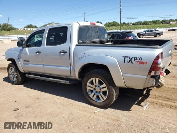 2011 Toyota Tacoma с VIN 3TMLU4EN2BM058933, выставлен на аукционе Copart как лот 80907645 с пробегом 139 365 миль миль и Списание • Salvage title. История ставок и продаж доступна на DreamBid. Изображение 2.