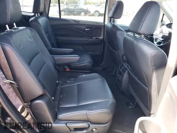 2020 Honda Pilot Touring 7-Passenger with VIN 5FNYF5H65LB009516, listed as a Copart auction lot 81001735 with 66,757 mi miles and Salvage title. Bid and sale history available at DreamBid. Image 11.