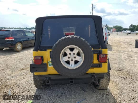 2006 Jeep Wrangler Sport z VIN 1J4FA49S16P732554, wystawiony jako Copart lot #70663185 z przebiegiem 124 922 mil mil oraz Szkoda całkowita • Salvage title. Historia ofert i sprzedaży dostępna na DreamBid. Obrazek 6.