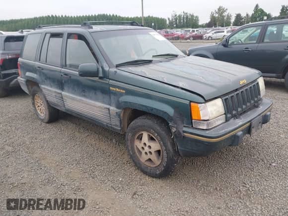 1993 Jeep Grand Cherokee Limited z VIN 1J4GZ78S1PC525798, wystawiony jako IAAI lot #42572328 z przebiegiem 197 551 mil mil oraz . Historia ofert i sprzedaży dostępna na DreamBid. Obrazek 1.