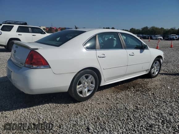 2013 Chevrolet Impala LT с VIN 2G1WB5E32D1112323, выставлен на аукционе Copart как лот 84607715 с пробегом 99 309 миль миль и Списание • Salvage title. История ставок и продаж доступна на DreamBid. Изображение 3.