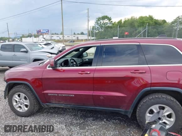 2017 Jeep Grand Cherokee Altitude with VIN 1C4RJFAGXHC688571, listed as a IAAI auction lot 42689557 with 145,121 mi miles and . Bid and sale history available at DreamBid. Image 14.