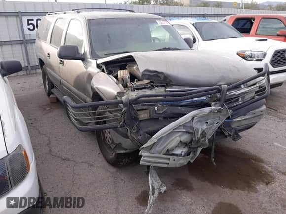 2002 Chevrolet Suburban LT z VIN 1GNFK16T32J239686, wystawiony jako Copart lot #73612184 z przebiegiem Nie podano mil oraz Szkoda całkowita • Salvage title. Historia ofert i sprzedaży dostępna na DreamBid. Obrazek 4.