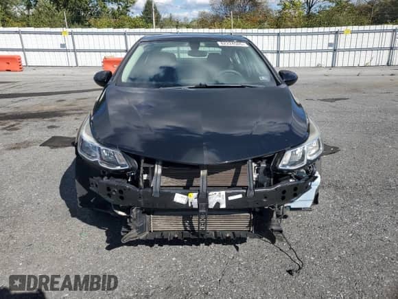 2017 Chevrolet Cruze LS z VIN 1G1BC5SM9H7214977, wystawiony jako Copart lot #82224505 z przebiegiem 80 992 mil mil oraz Szkoda całkowita • Salvage title. Historia ofert i sprzedaży dostępna na DreamBid. Obrazek 5.