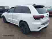 2016 Jeep Grand Cherokee SRT with VIN 1C4RJFDJ0GC456325, listed as a IAAI auction lot 41425211 with 159,746 mi miles and . Bid and sale history available at DreamBid. Image 3.